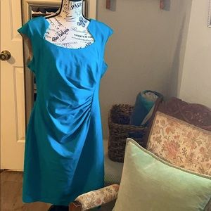 Cap sleeve teal dress perfect for work or drinks.